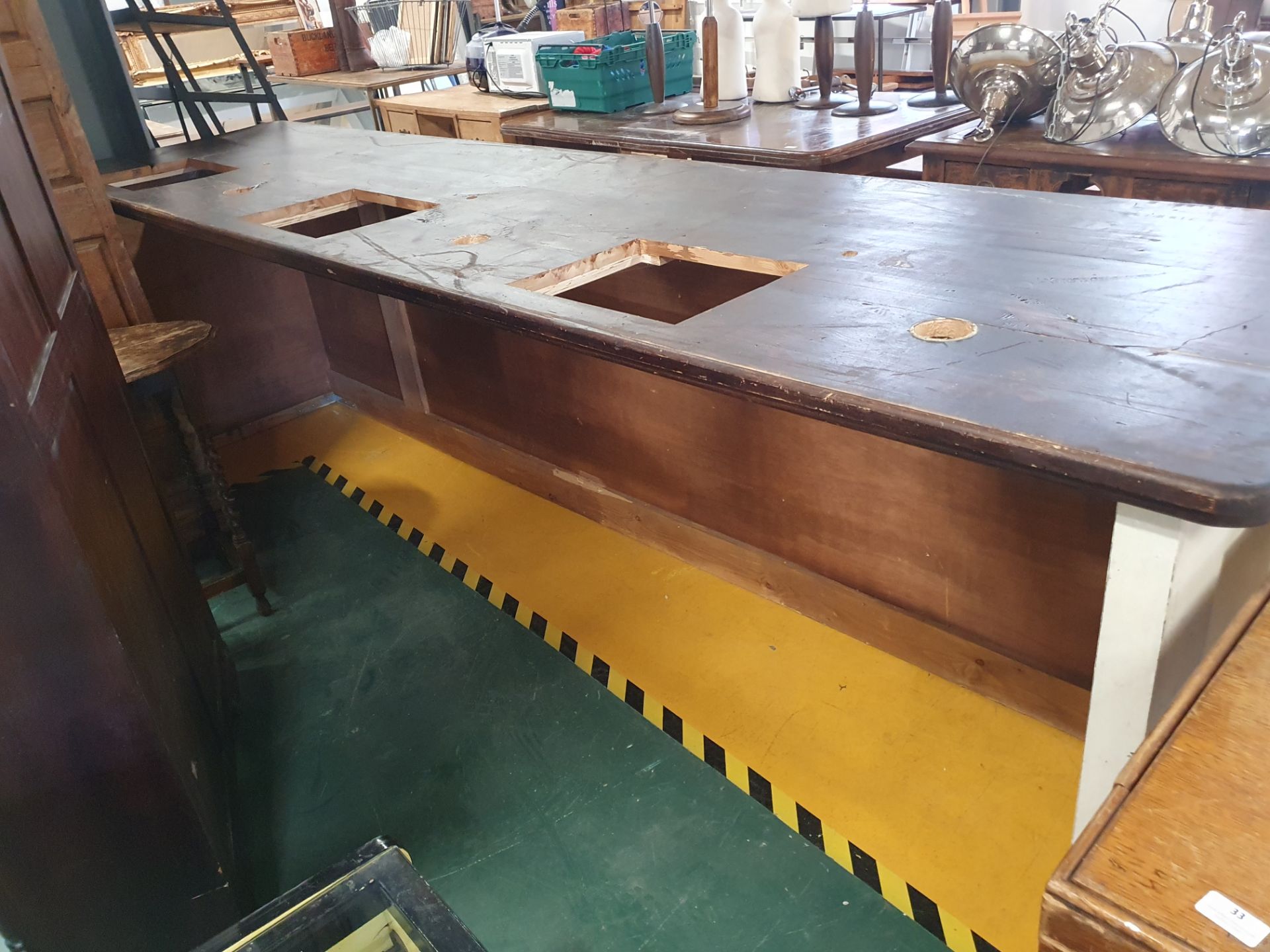 * Large counter unit with decorative frontage, solid pine top with till cutouts. 3300w x 800d x - Image 3 of 3