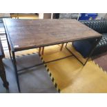 * metal frame display table with rustic wooden top. 1500w x 800d x 850h