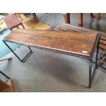 * mid-level industrial metal frame display table with rustic wooden top 1400w x 350d x 620h