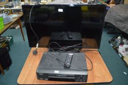 LG 31" TV with Remote, and a Matsui VHS Player