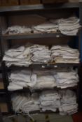 Quantity of White Work Tops and Trousers
