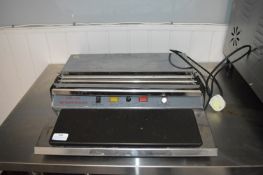 *HW450 Tray Wrapping Sealer