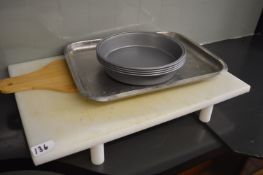 *White Chopping Board, Bamboo Serving Platter, Stainless Steel Tray, and Four Non-Stick Roasting