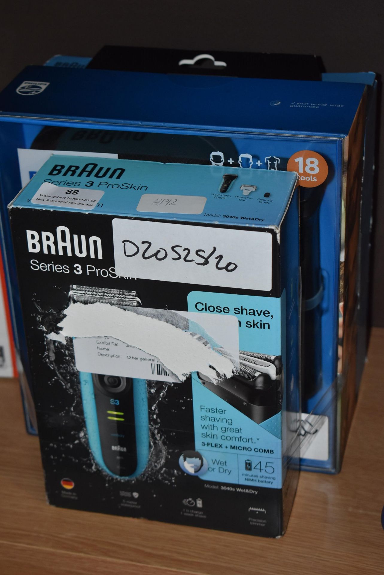 Two Braun and One Philips Trimmers