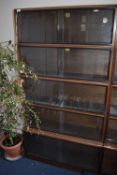 *Simplex Sectional Bookcase in Medium Mahogany Finish Enclosed by Sliding Glass Doors