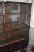 *Simplex Sectional Bookcase in Medium Mahogany Finish Enclosed by Sliding Glass Doors