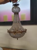 * Heavy chandelier light fitting - with ornate details.