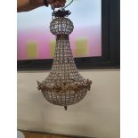 * Heavy chandelier light fitting - with ornate details.