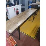 * folding bench - wooden top and heavy metal base. 2200w x 500d x 780h