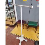 * white tubular with cast iron base clothes rail