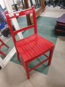 * red wooden chair