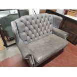 * Grey leather sofa
