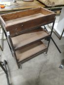 * industrial display unit on castors with rustic shelves