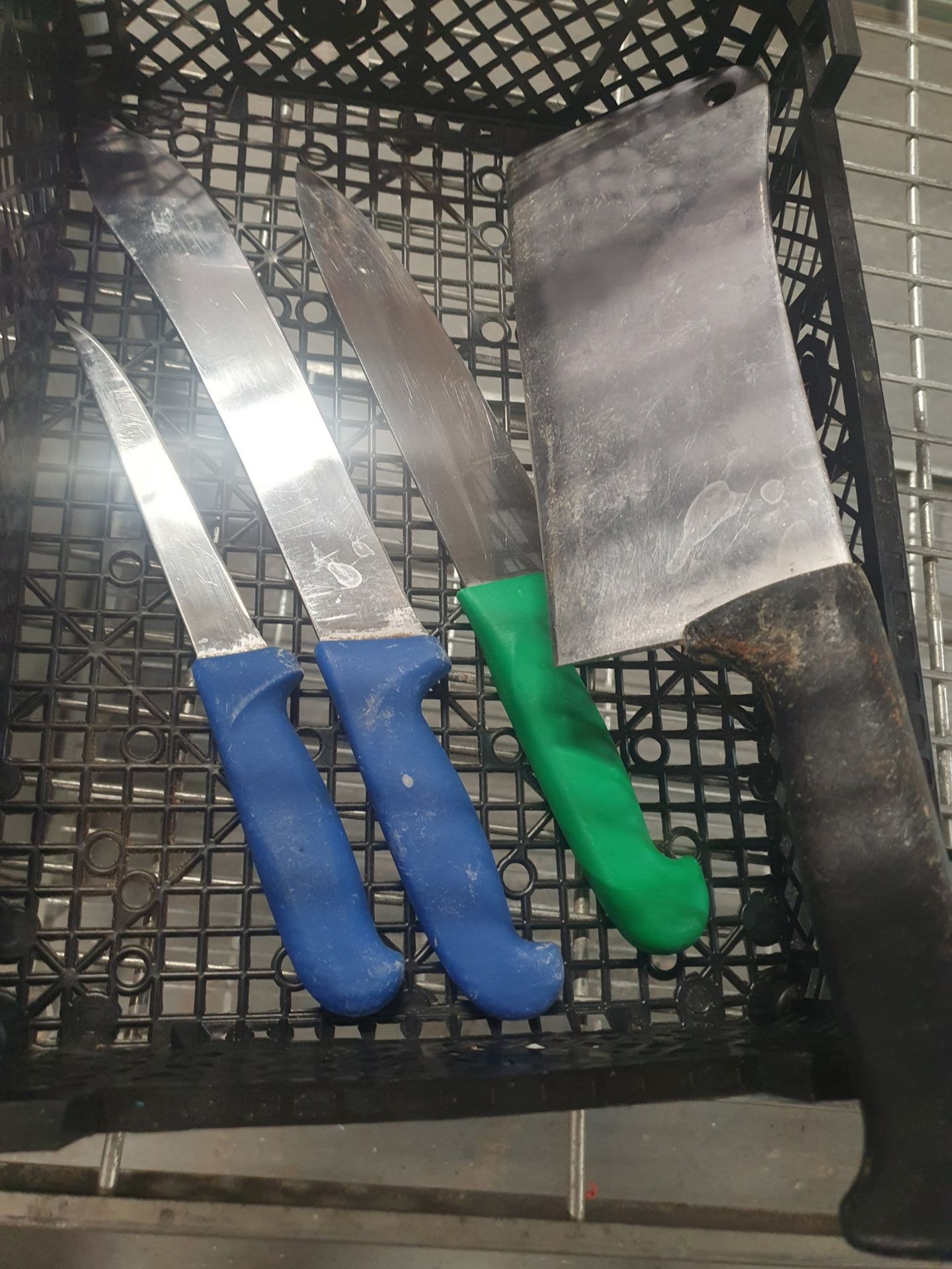* heavy meat cleaver plus 3 other knives