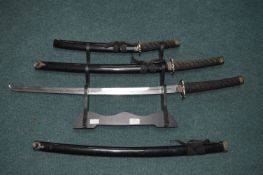 Set of Three Decorative Japanese Swords with Stand