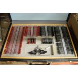 Opticians Suitcase Containing a Quantity of Concave and Convex Spheres and Cylinders