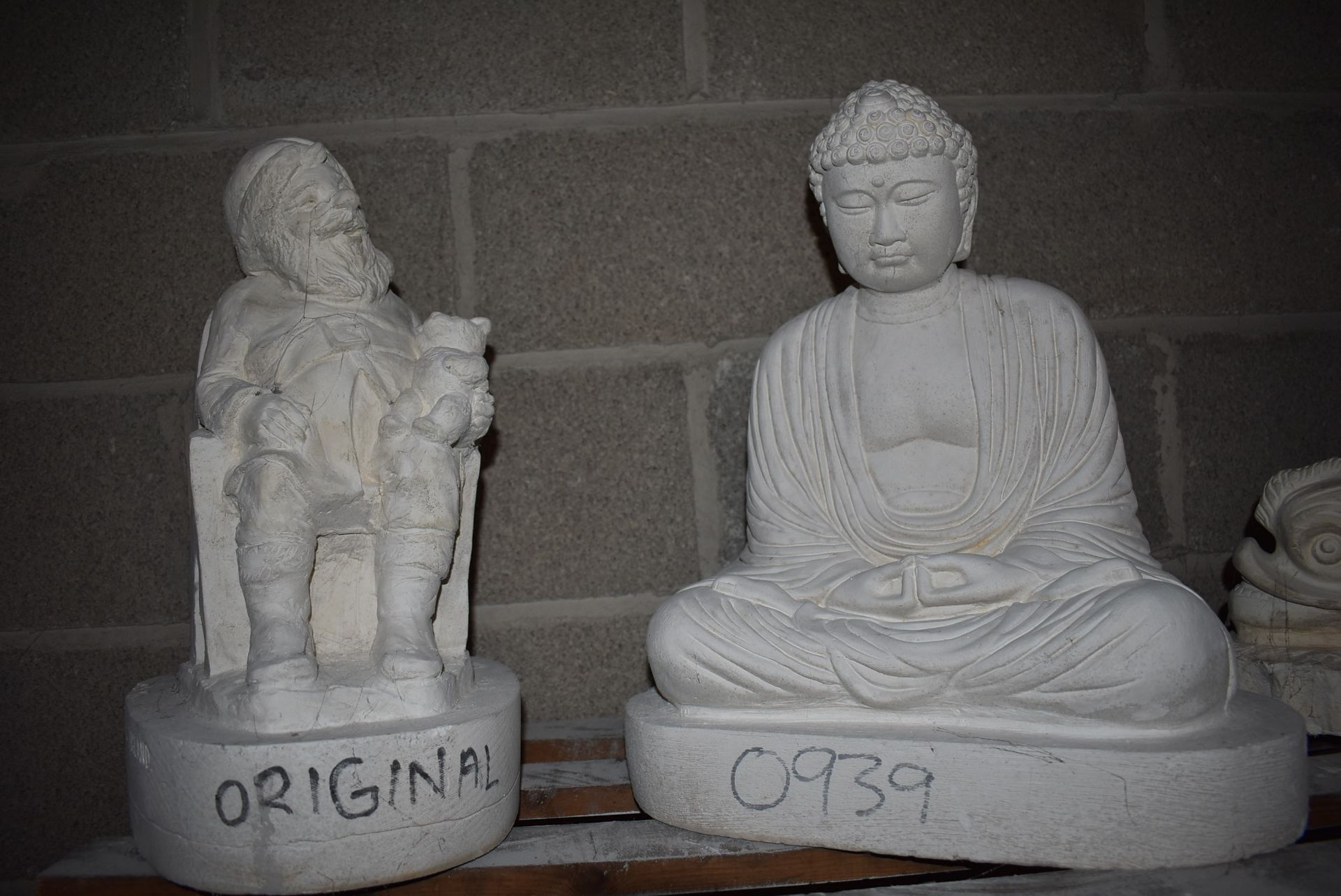 *Contents of Shelf to Include Buddha and Santa Casts