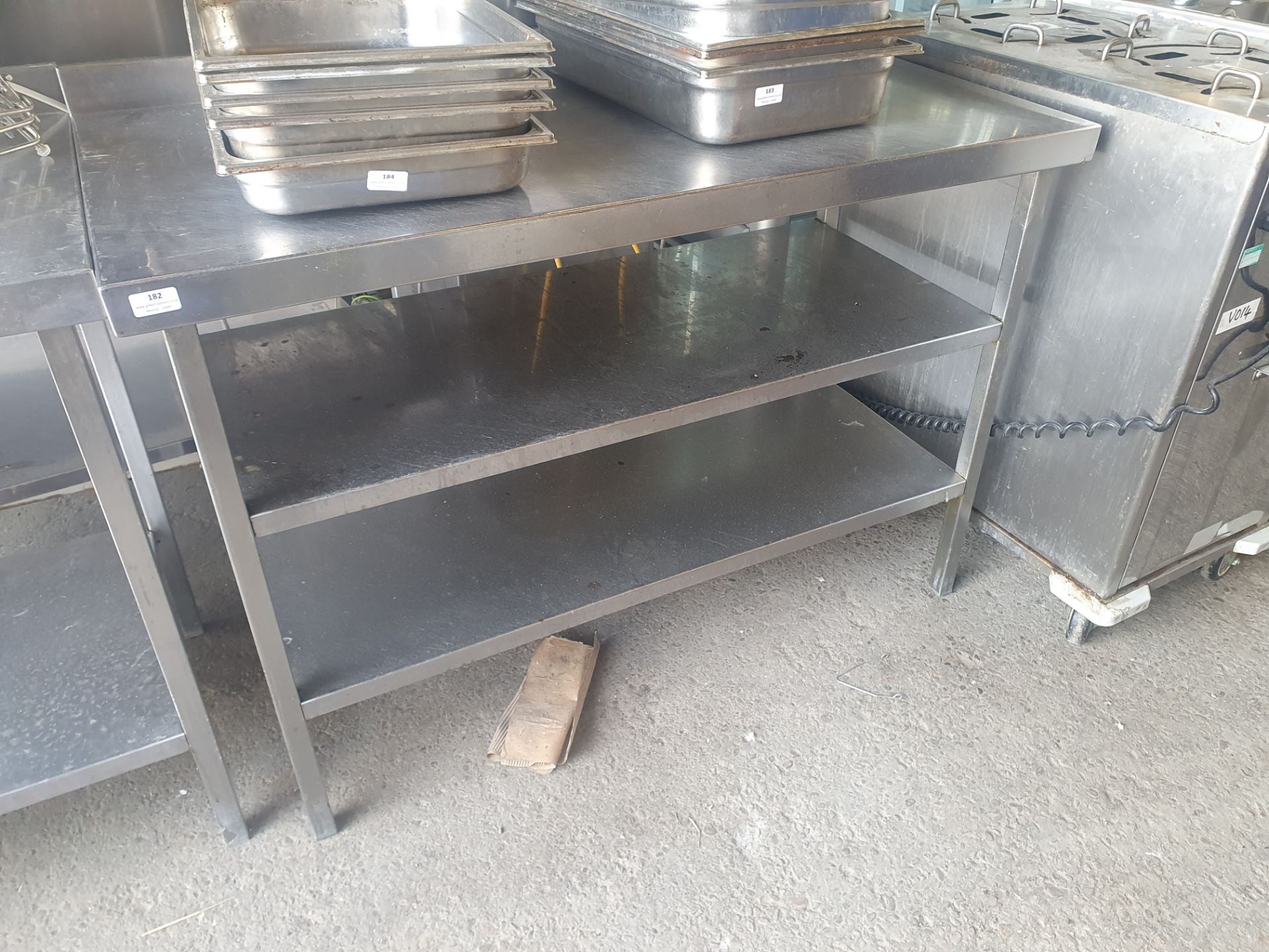 * S/S prep bench with 2 undershelves. 1200w x 600d x 840h