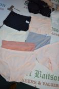 *Seven Pairs of Assorted DKNY, Calvin Klein, and Midnight Ladies Briefs Size: S/M and M