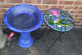 Blue Ceramic Birdbath and a Humming Bird Table