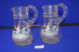 Two Mary Gregory Green Glass Jugs - Boys with Feathers