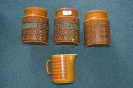 Three Hornsea Pottery Bronte Pattern Storage Jars, and a Saffron Jug