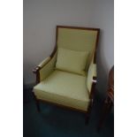 Green Upholstered Armchair with Wooden Frame