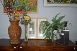Artificial Flowers and a Table Lamp