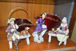 Three Figurines and Two Cranberry Glass Baskets