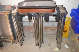 Fourteen Chrome Tray Stands and Seventeen Trays