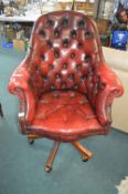 Chesterfield Red Leather Swivel Armchair