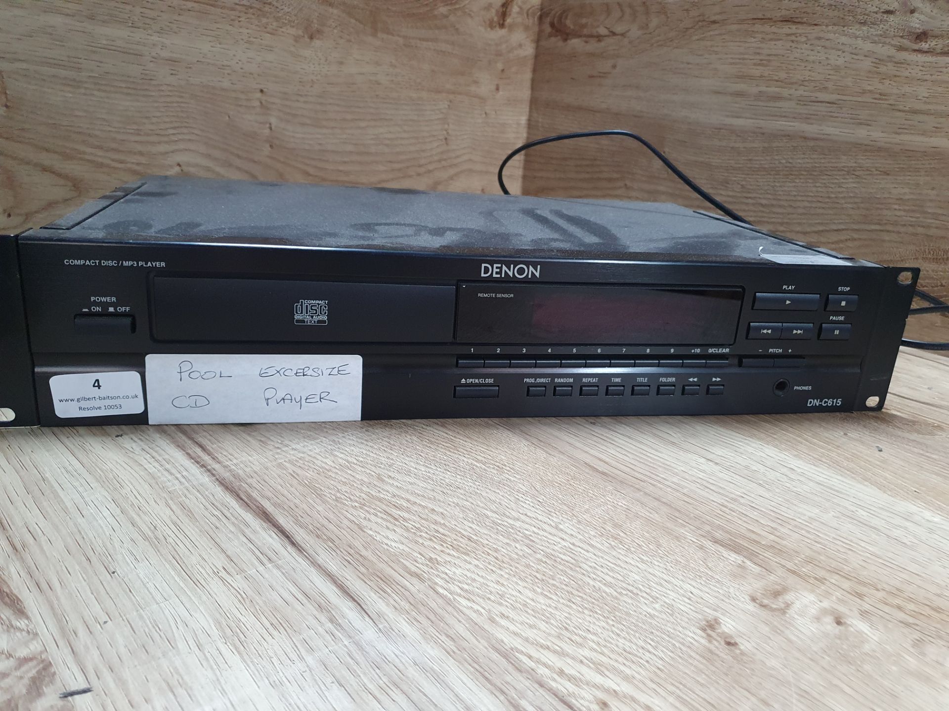 * Denon compact disk/MP3 player