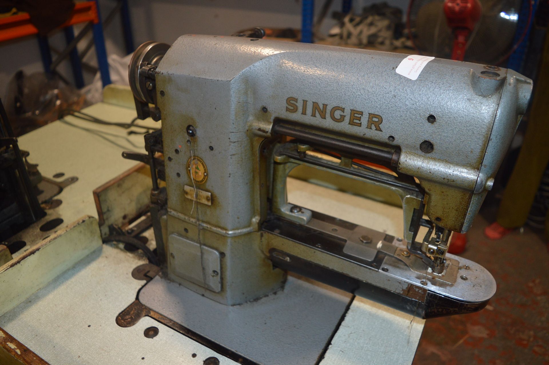 Singer Tacking Sewing Machine on Table with Electric Motor