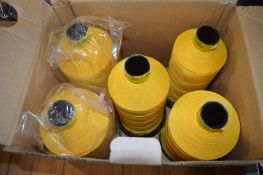 Five Mustard Yellow Bonded Polyester Bobbins