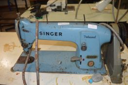 Singer Professional 331K104 Sewing Machine on Table with Electric Motor