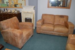 Two Seat Leather Sofa and a Matching Single Armcha