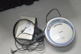 Sony Walkman and a Watson Portable CD Player
