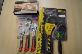 Sandpaper Holder, 3pc Adjustable Wrench Set, and a