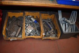 *Four Boxes of Assorted Clamps, Fixings, Steel Brackets, etc.