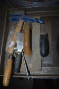 *Bricklayer’s Trowel and a Scutching Hammer