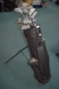 Golf Bag with Stand Containing Assorted Clubs