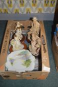 Figurines and a Decorative Plate