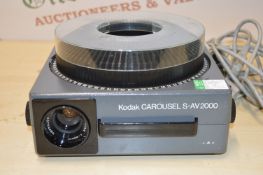 * Kodak S-AV2000 carousel slide projector in case