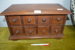 Small Eight Drawer Wooden Chest