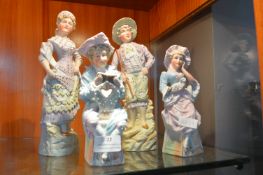 Two Pairs of Period Figurines