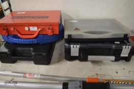 Four Empty Toolboxes, and a Metal Toolbox with a Quantity of Screws