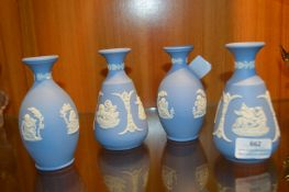 Four Small Wedgwood Blue & White Jasperware vases