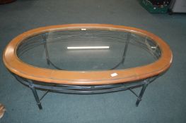 Oval Metal Framed Glass Topped Coffee Table