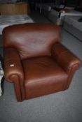 *Brown Faux Leather Armchair