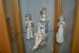 Four Child Figurines by Lladro, Nao, and Casades